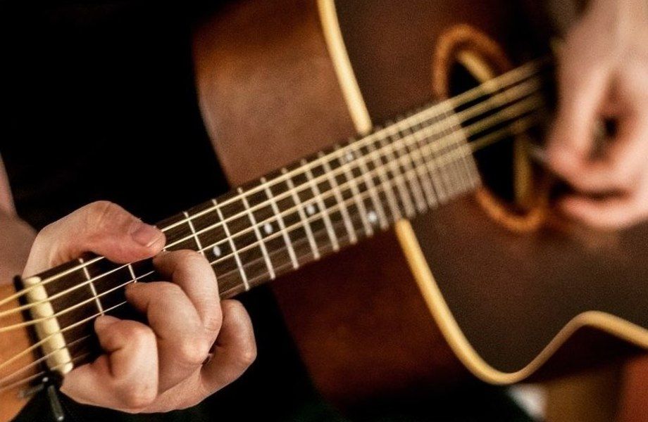 Музыкальная школа игры на гитаре и обучение вокалу